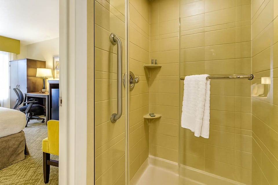 Rinse off in a clean walk-in shower with grab bar.