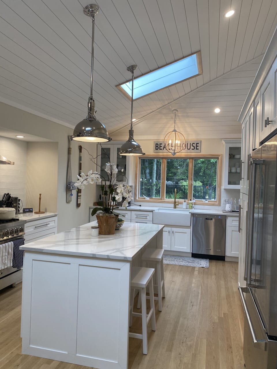Open, airy gourmet kitchen for cooking and congregating 