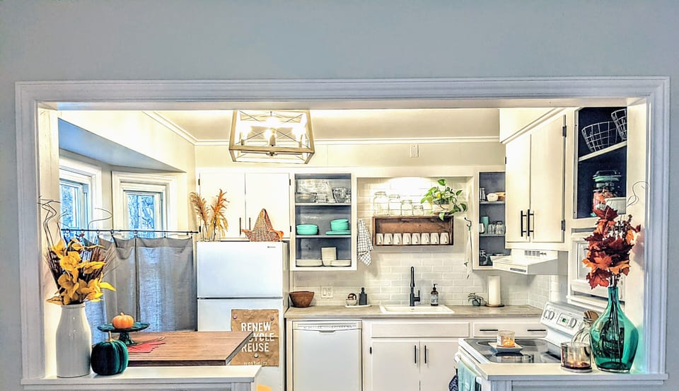 small but efficient kitchen. another fridge in basement if needed.