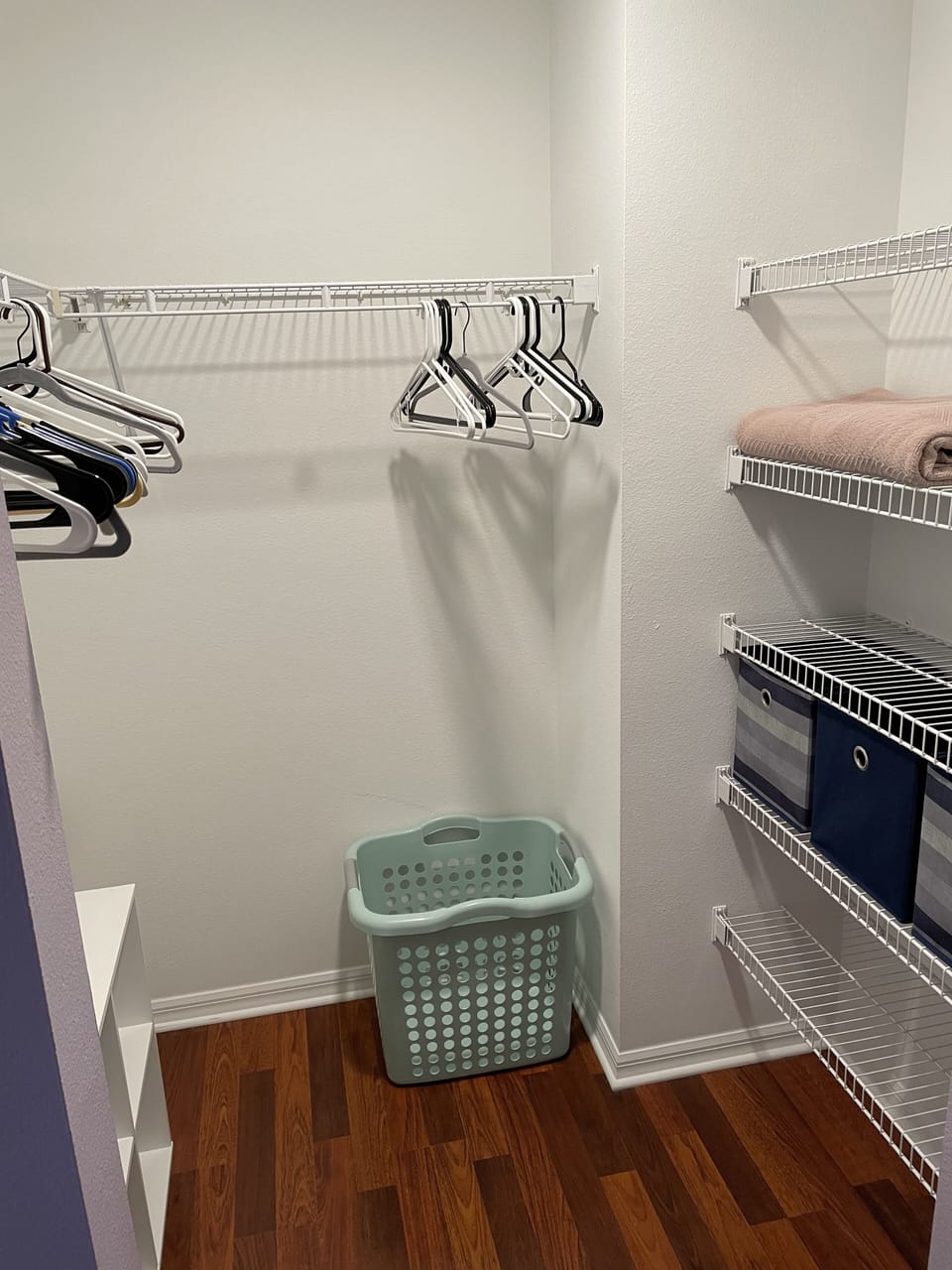 Master bedroom walk in closet. Enough room to hold all of your necessities. 