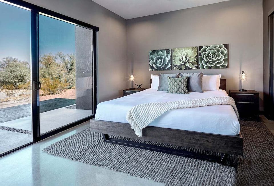 Bedroom 2 with private patio and en suite bath
