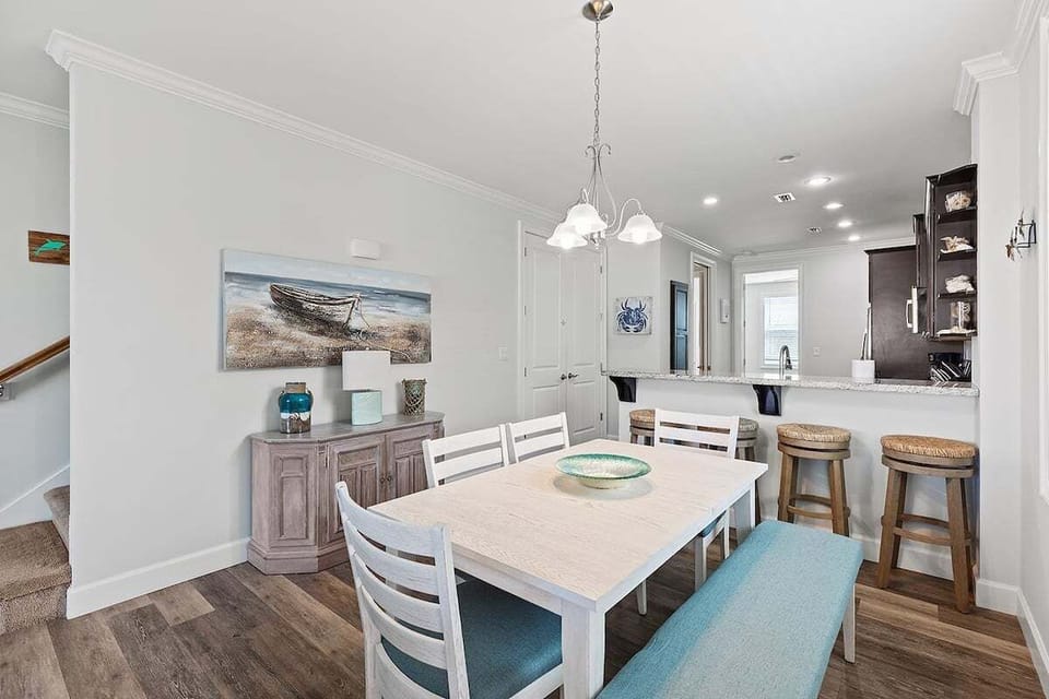 Open-concept dining area and full kitchen.