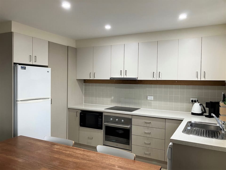 Kitchen has large pantry