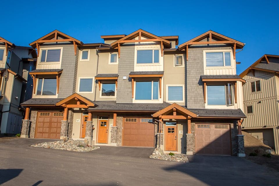 Echo Landing 39 with private entrance, two car garage and driveway.