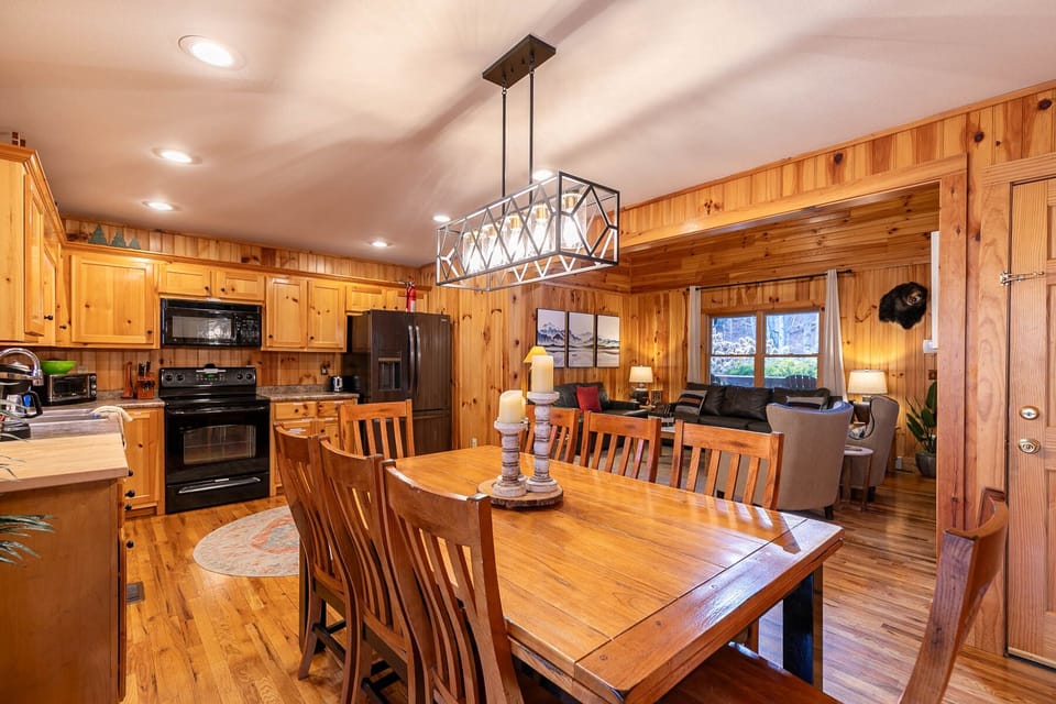 Gather the whole crew around the solid wood dining table, with the kitchen just steps away and the living room right around the corner.