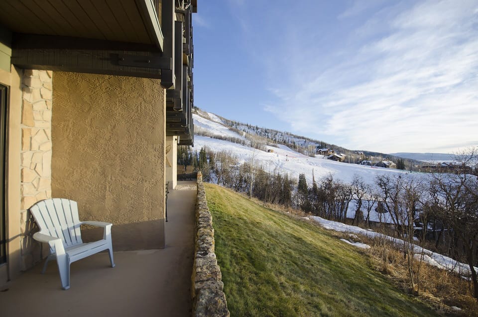Sweeping mountain views greet you from your private balcony, where snowy peaks and rolling meadows create the perfect backdrop for morning coffee.
