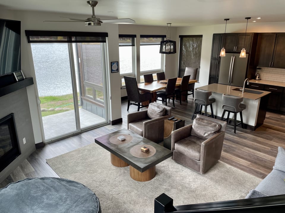 View of family room and kitchen from the staircase