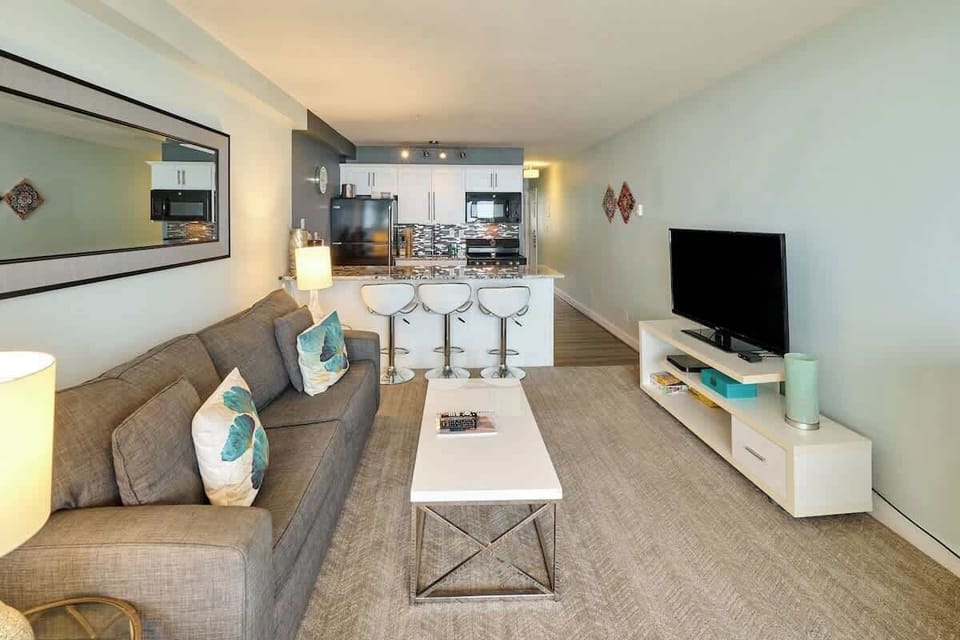 Kick back and watch your favorite shows. The unit has large 50-inch flatscreen TVs in both rooms.