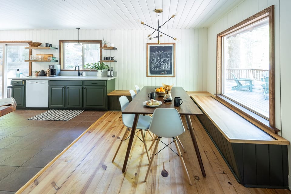 Dining area with custom bench seating for 8 guests 