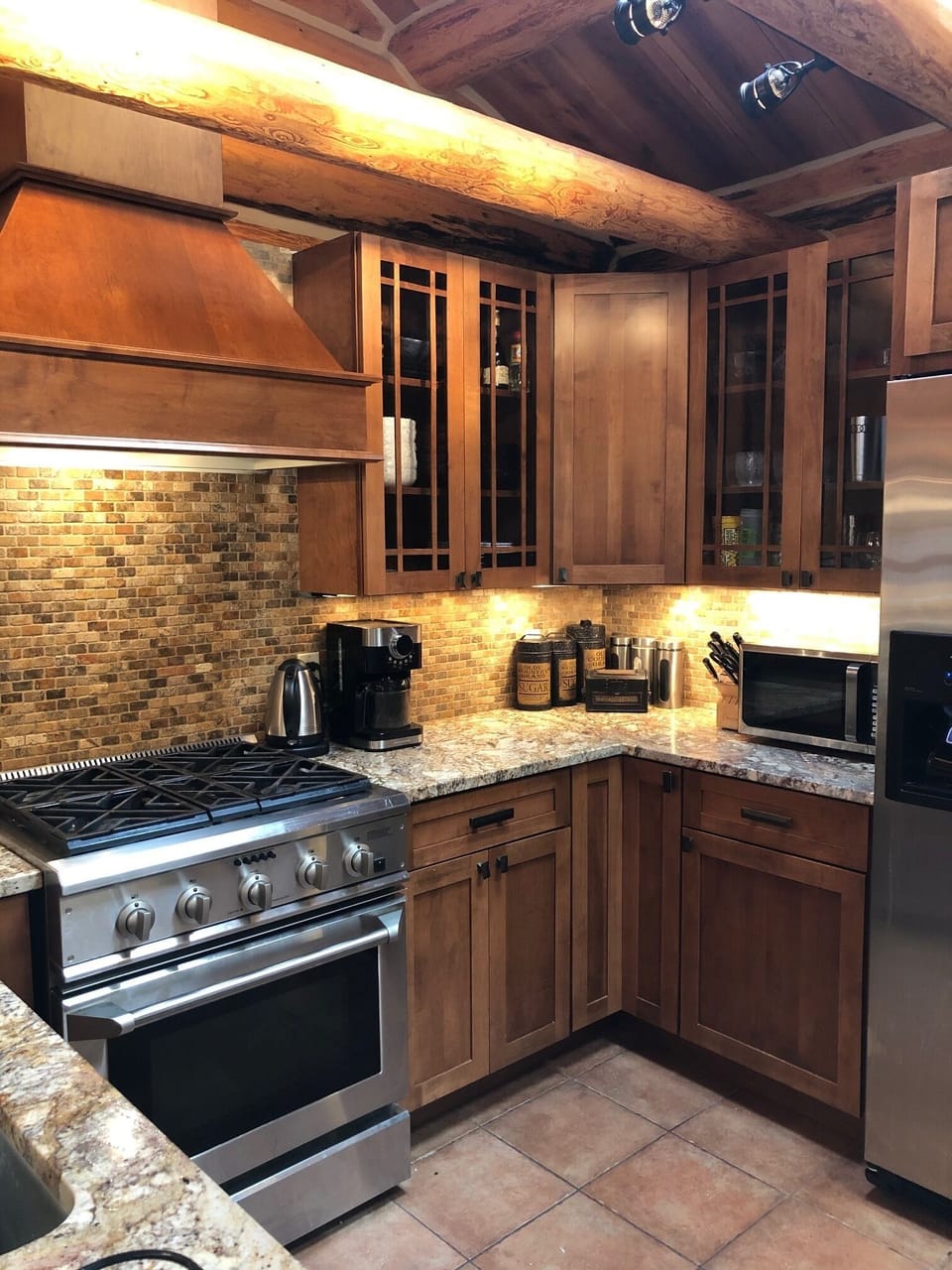 amazing kitchen- granite counter, oven, gas stove, toaster oven, microwave
