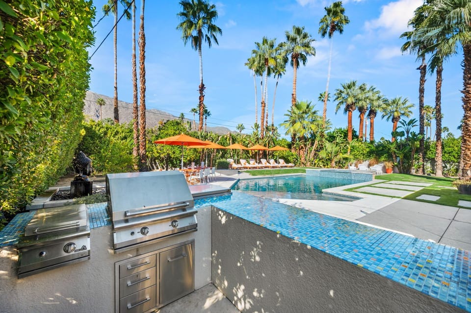 Sizzle up your favorite meals on this premium outdoor grill while overlooking the sparkling pool and swaying palms in your private oasis.