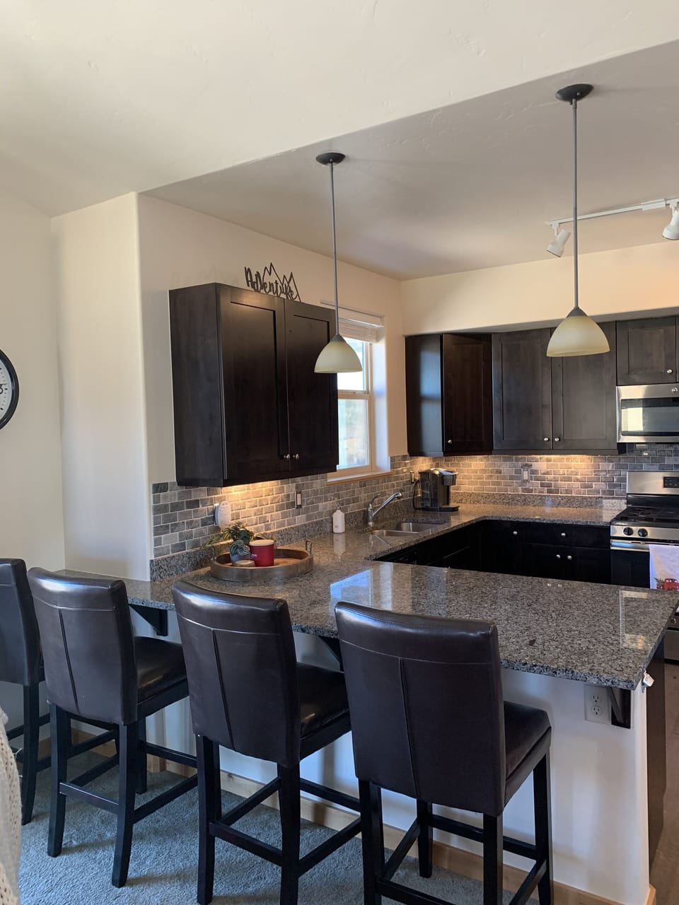Large breakfast bar for meals. Extra barstools in second bedroom 