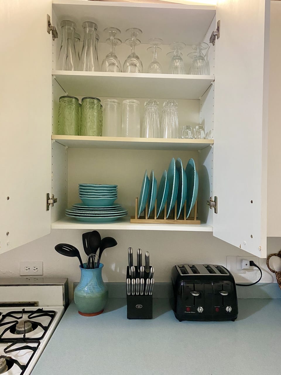 Plenty of dishes and glasses for your use.