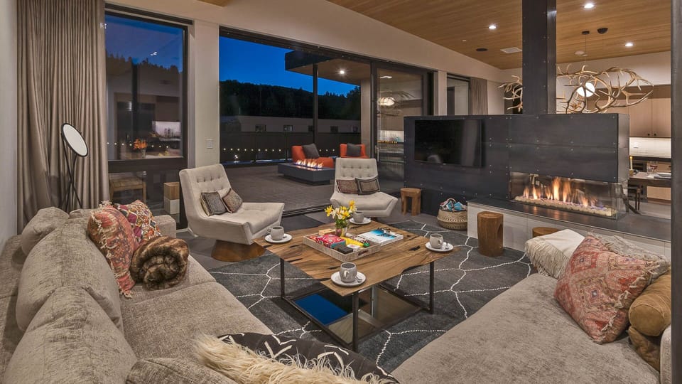 Great room with TV and fireplace