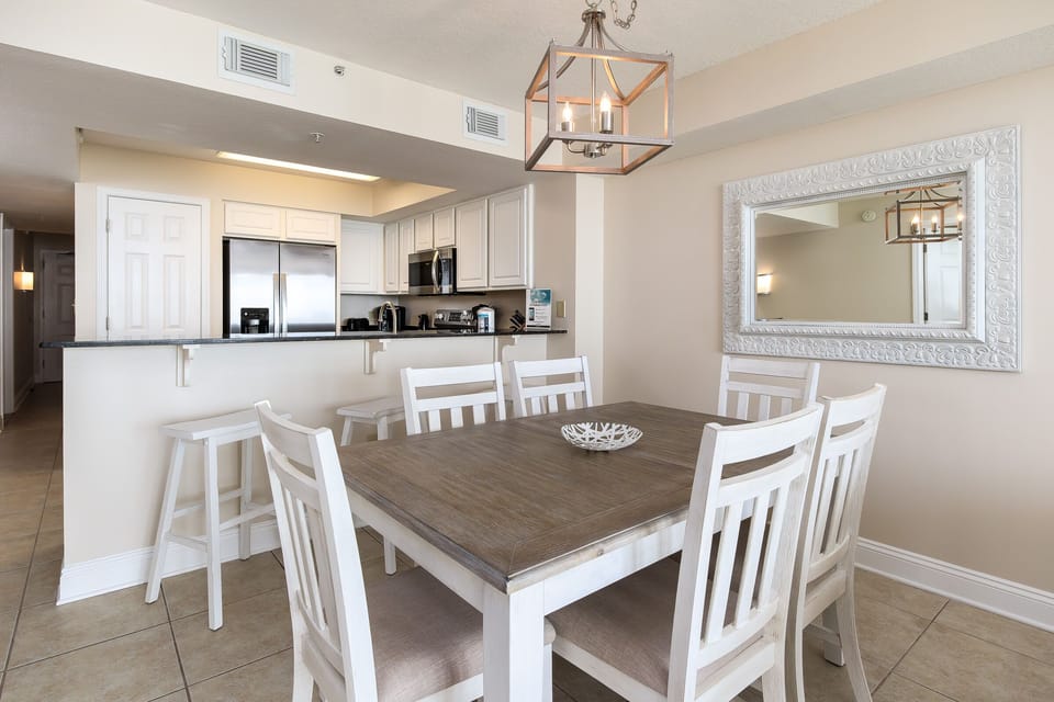 Dining Room Area - Seating for six at the dining room table; along with 3 barstools for extra seating