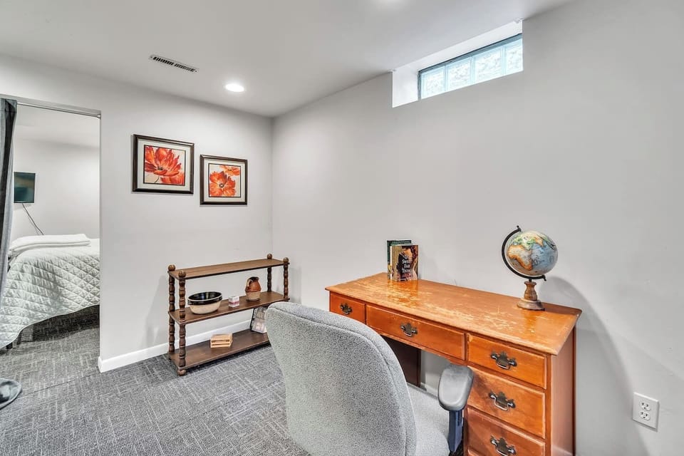 Need to attend to work? Feel free to set up your laptop on the office desk.