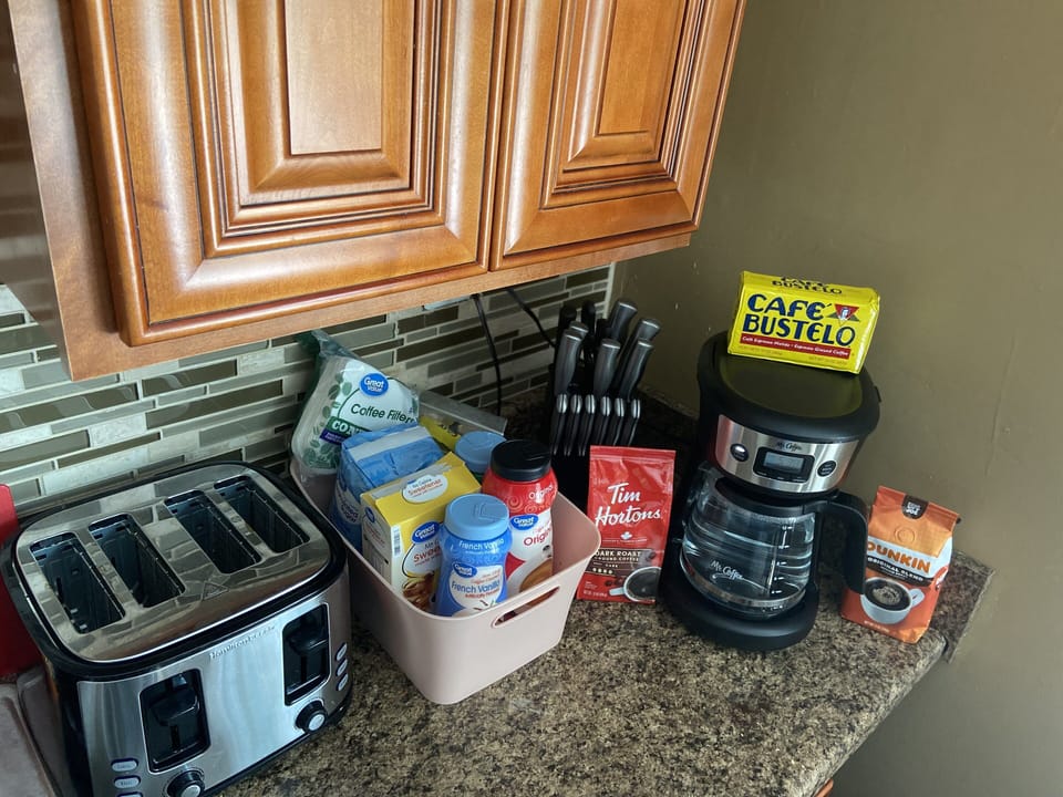 Coffee Station with coffee varieties, creamers, sugar & sugar free options. 