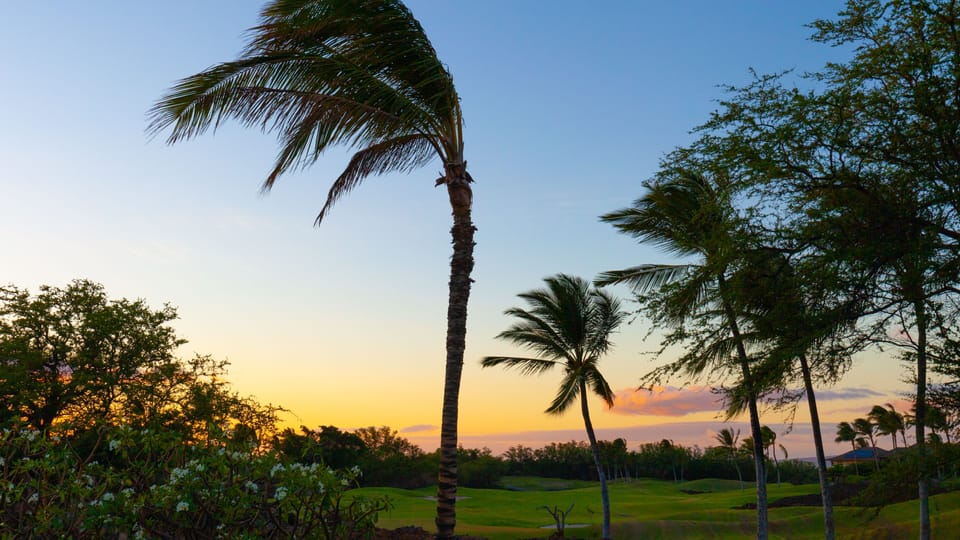 Golf course and sunset views from the upstairs lanai