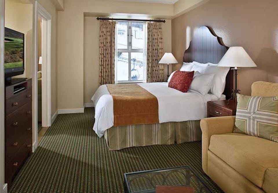 Sample master with king bed and pull out sofa. Decor may vary. 