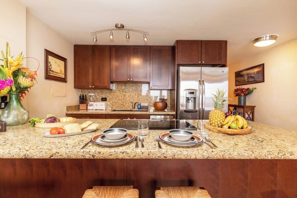 Modern kitchen equipped with stainless steel appliances and ample storage space