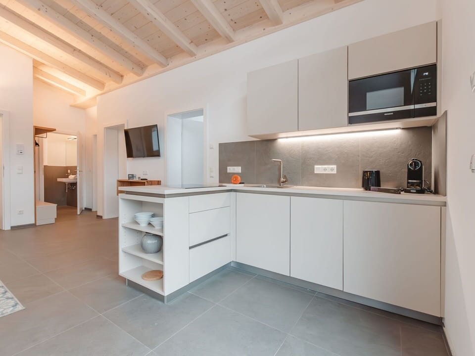 Cabinetry, Countertop, Building, Kitchen, Kitchen Appliance, House, Wood, Interior Design, Kitchen Stove, Drawer