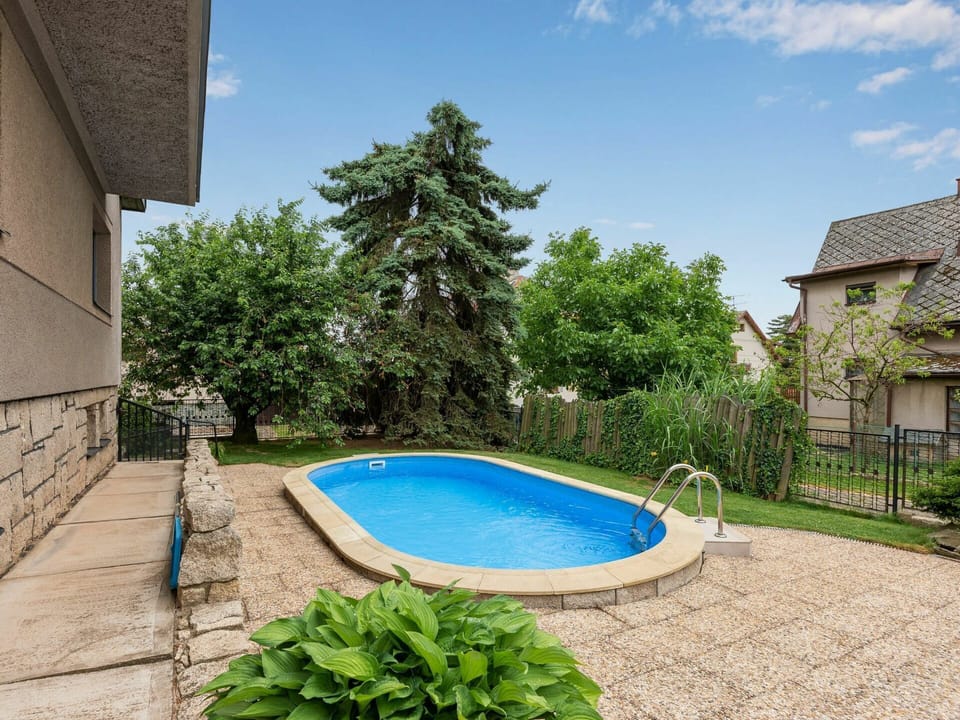 Water, Plant, Sky, Building, Property, Cloud, Azure, Swimming Pool, Shade, Tree