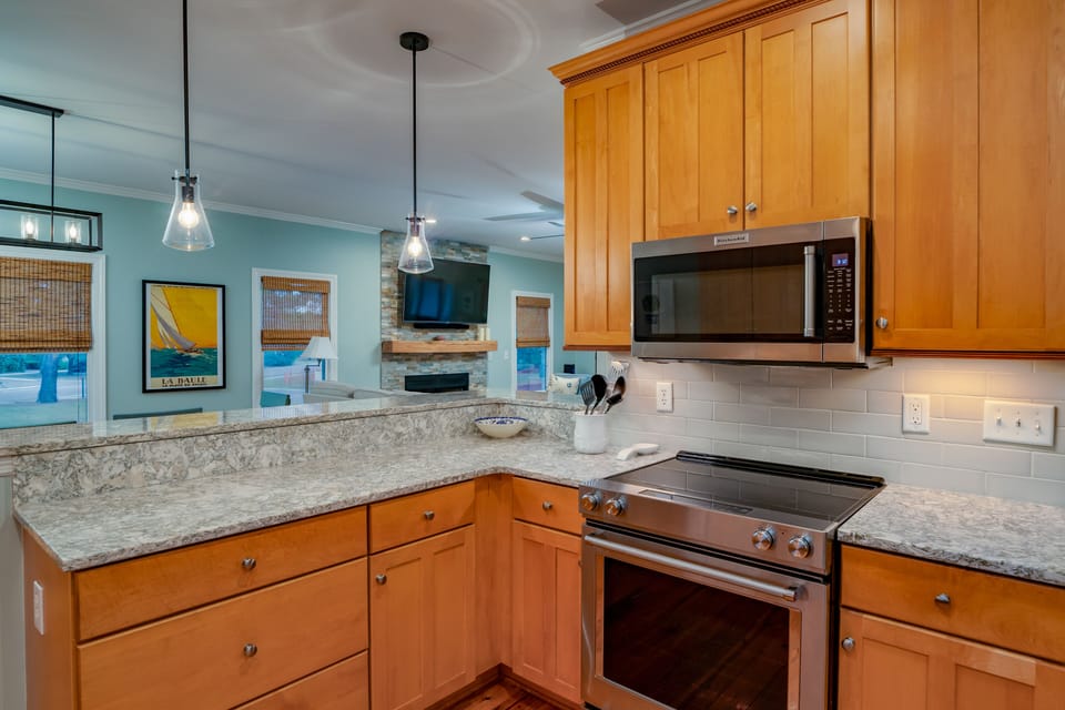 Large kitchen with new appliances.