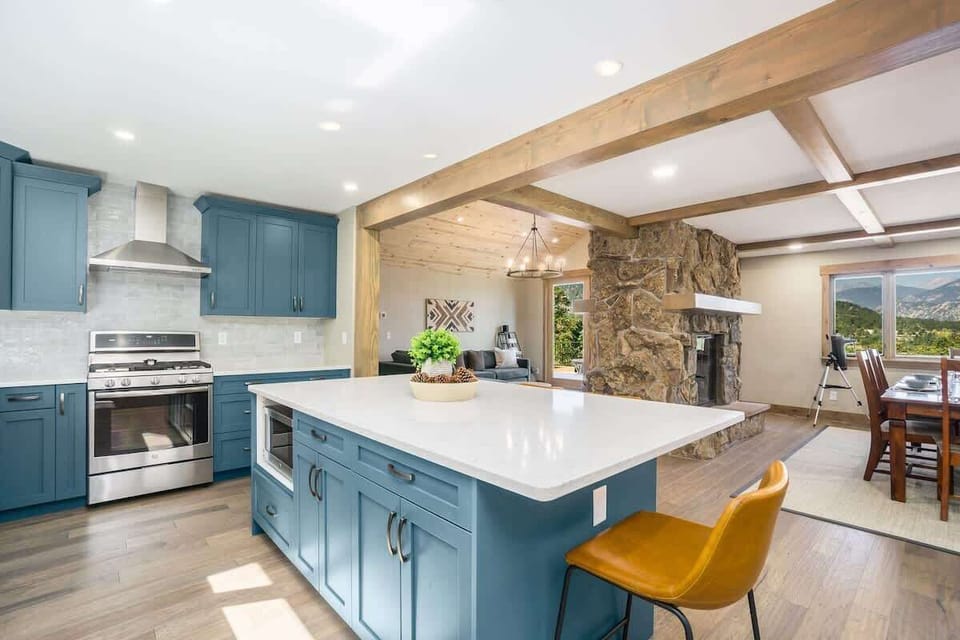 A newly designed kitchen with a serving and dining island to make sure you don't miss out on any of the conversation.