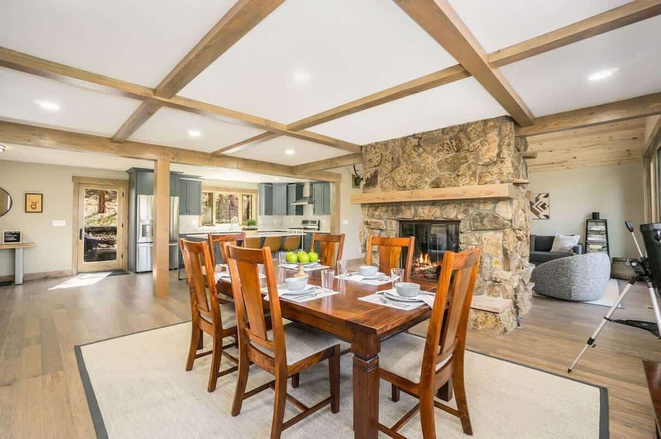 Your dining room view includes dining next to the center fireplace.