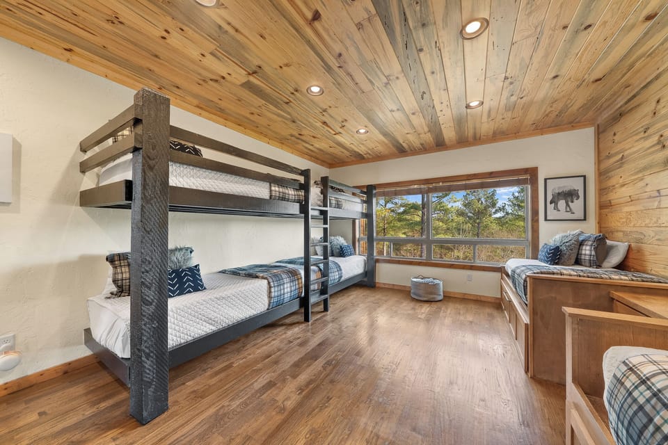 A private bunk retreat designed for kids, teens, and late-night laughs. Sleeps 8.