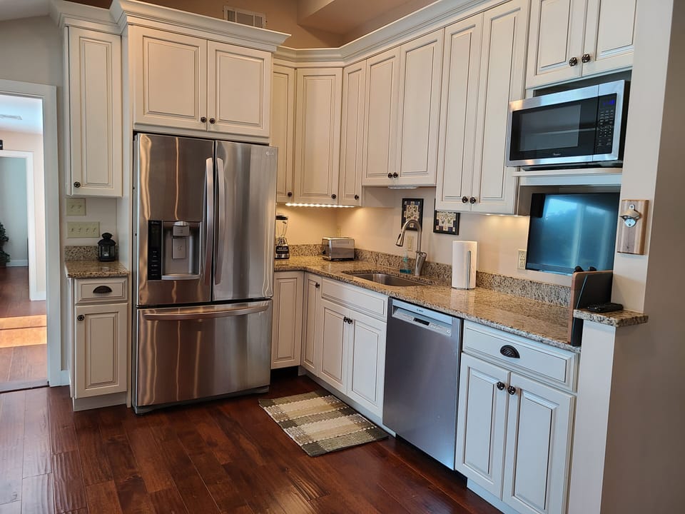 Stainless steel and granite counter tops and new appliances