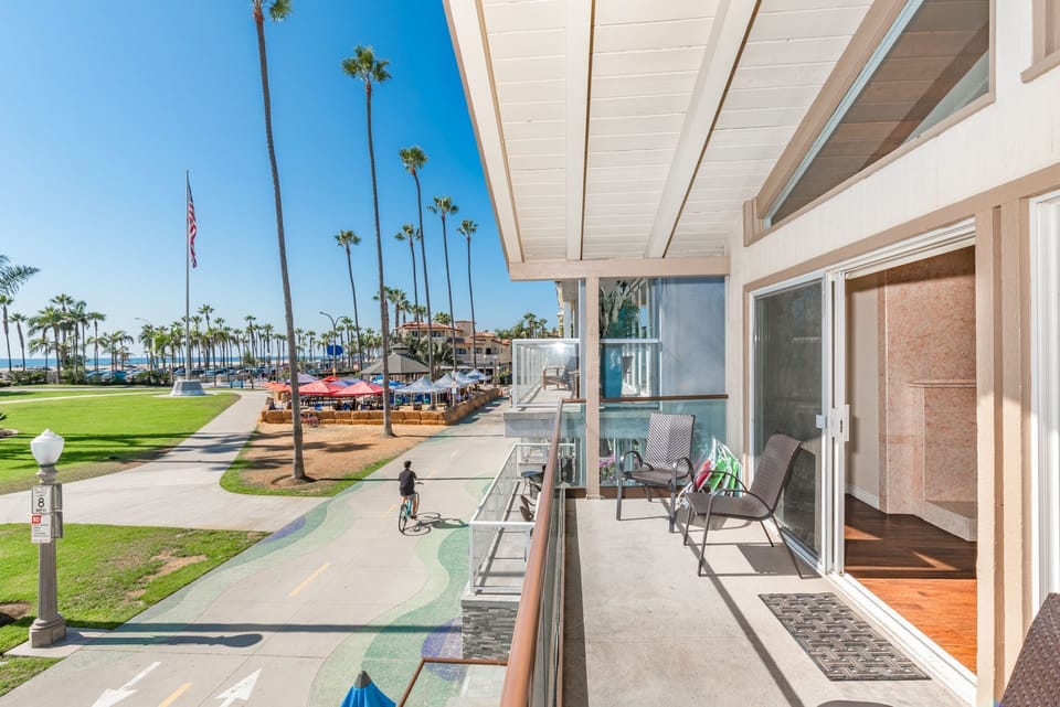 The boardwalk awaits! Perfect for morning strolls or sunny bike rides.
                