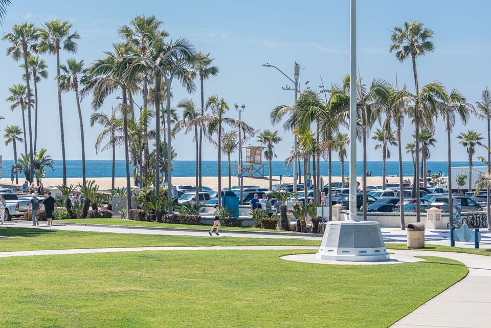 The beachfront park and boardwalk are just outside your door.
                