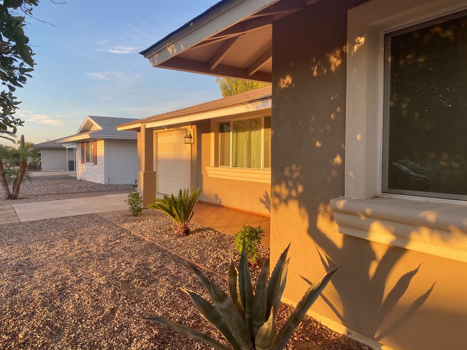 Clean house with a fresh stucco job.