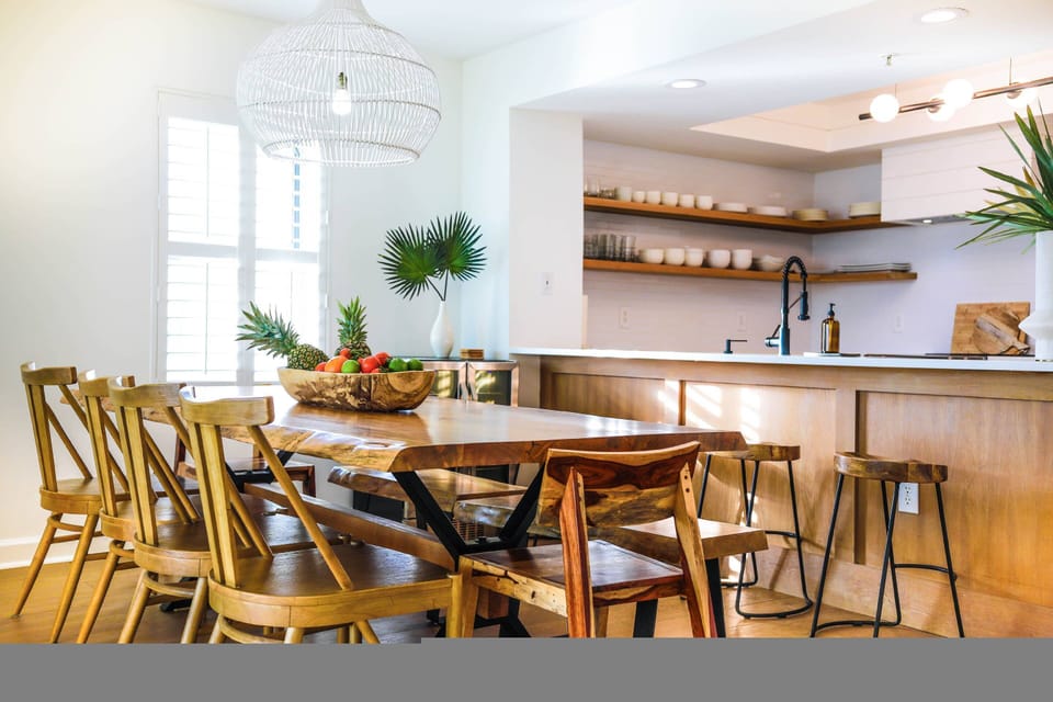 You can seat up to 8 people at the dining table and 4 people on the kitchen stools.