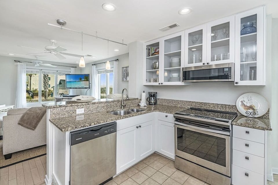 Kitchen with stainless steel appliances, Tidewater 101I, Isle of Palms, SC | IOP Escapes