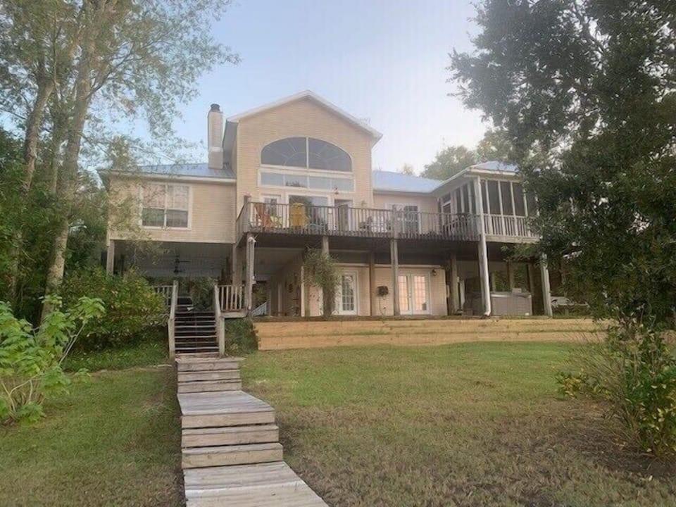 Back View facing Bayou Acadia and dock area