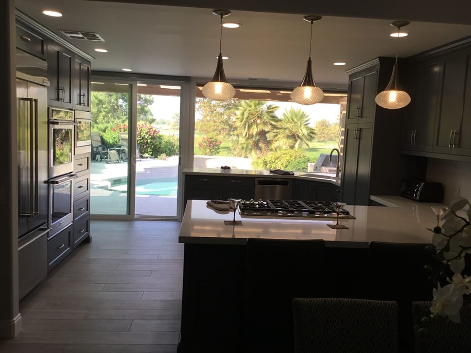 3 bar stools offer views of the pool and 18th hole=Westin Pete Dye golf course