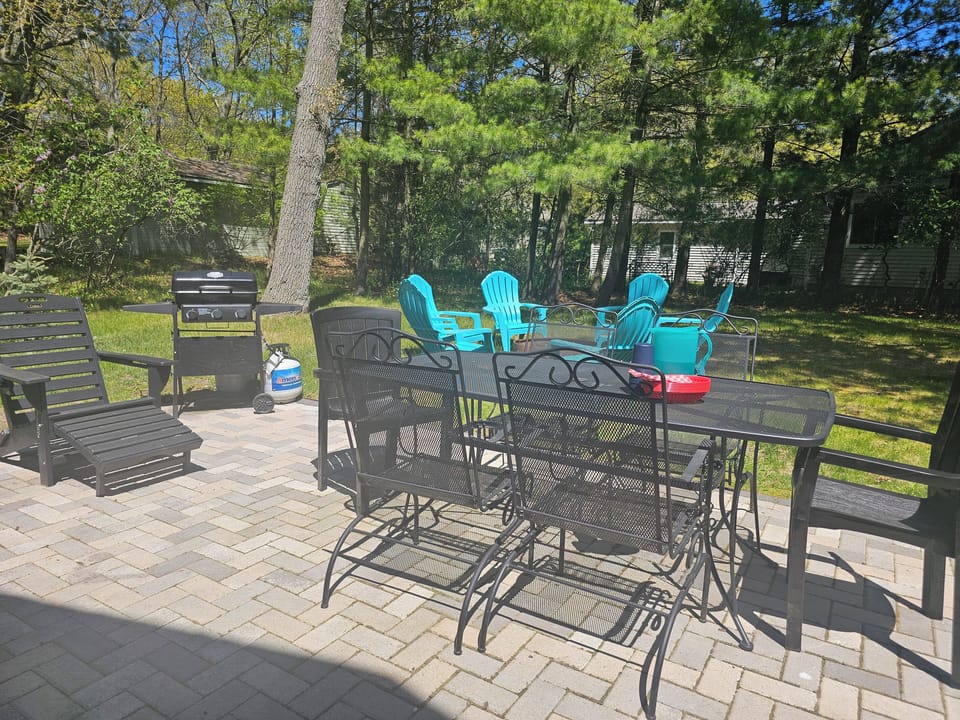 Patio with dining area + grill