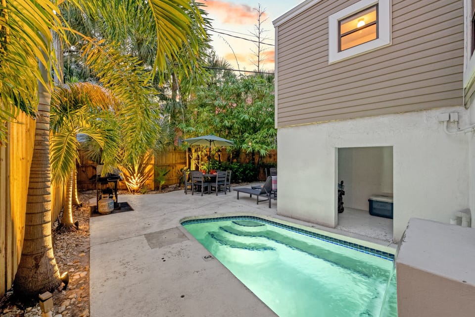 Slip into serenity—this heated pool is your front-row seat to the Siesta Key.