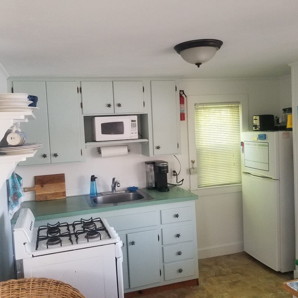 Kitchenette 
microwave, Keurig, gas stove/oven, cooking and dinnerware