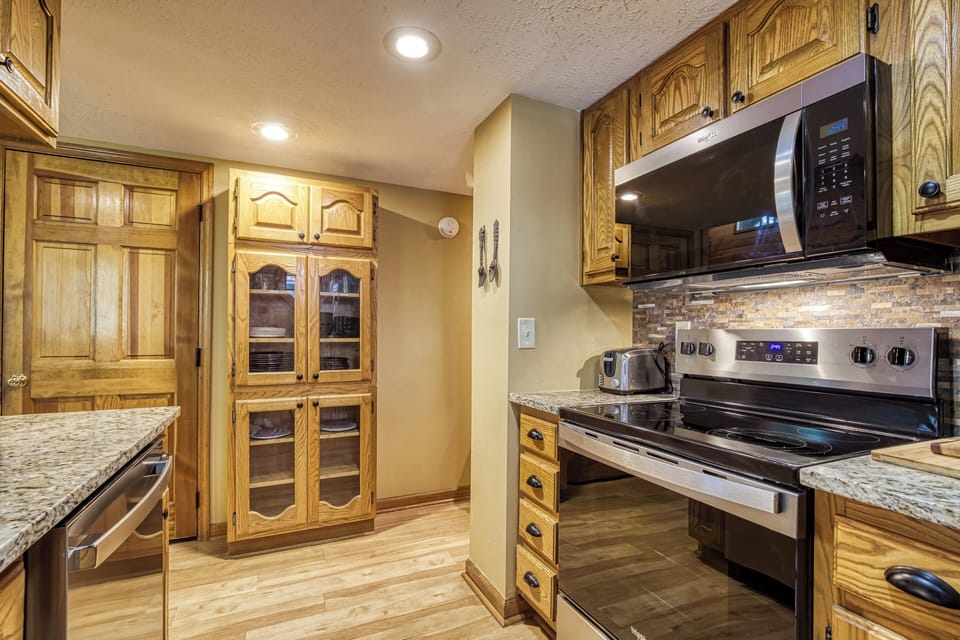 Vacation Rental in Pigeon Forge with a Hot Tub "Forest Hollow" - Fully furnished kitchen with stainless steel applliances