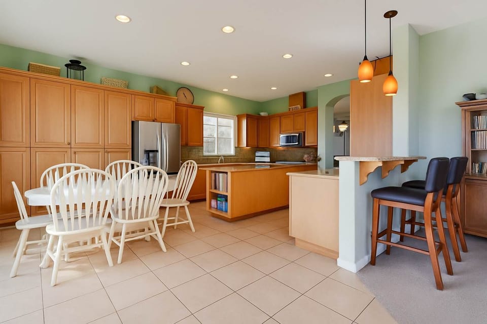Bright and welcoming kitchen with plenty of room to cook, gather, and enjoy meals together.