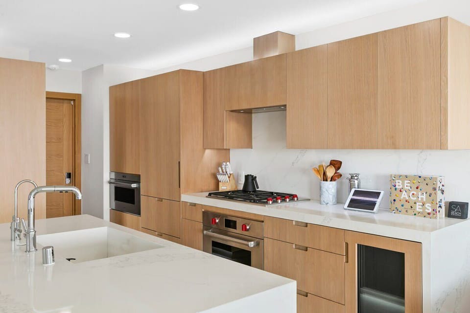 Custom white oak cabinetry, with European finger pulls