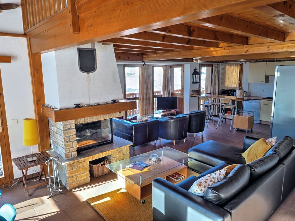 Spacious lounge with a real log fire.