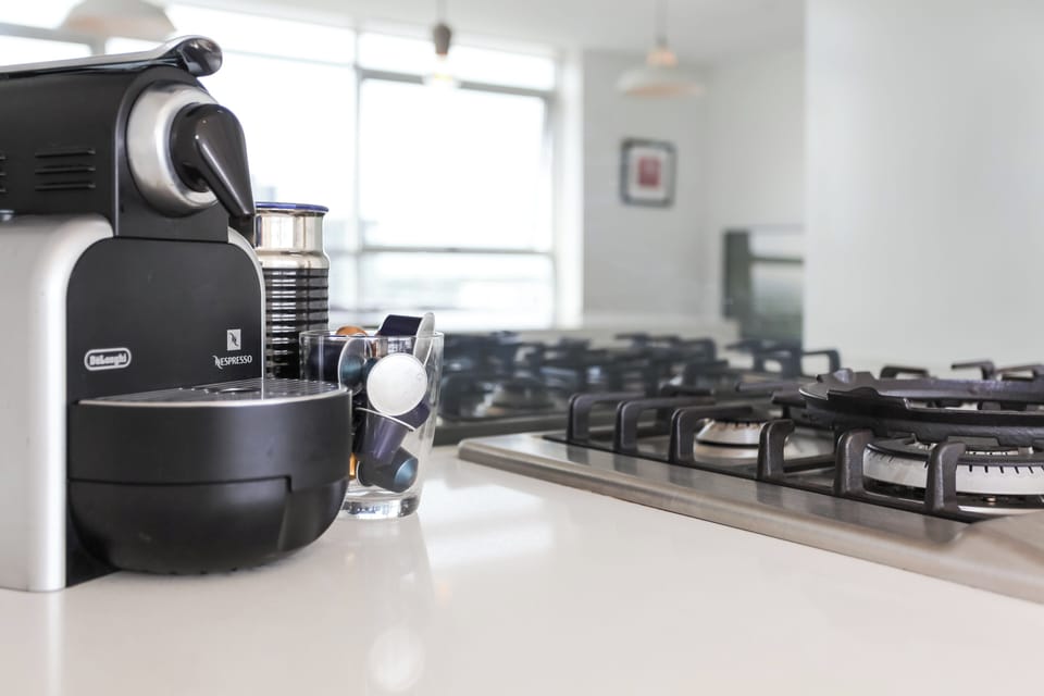Nespresso machine with initial supply of capsules