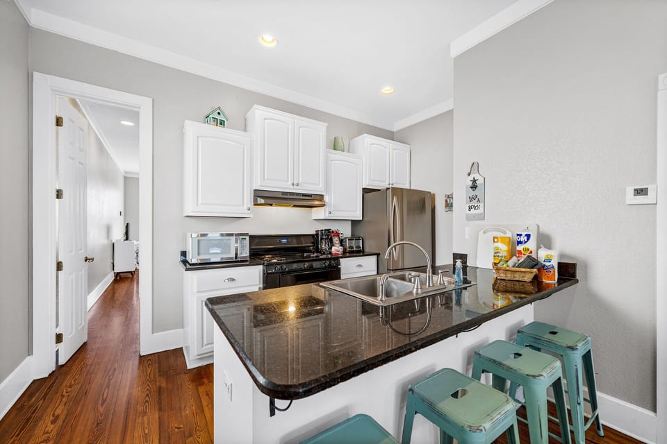 Bar seating and kitchen