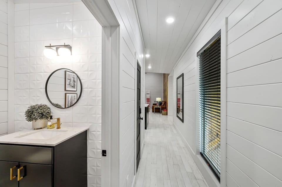 A half bath is also available for guest convenience. 