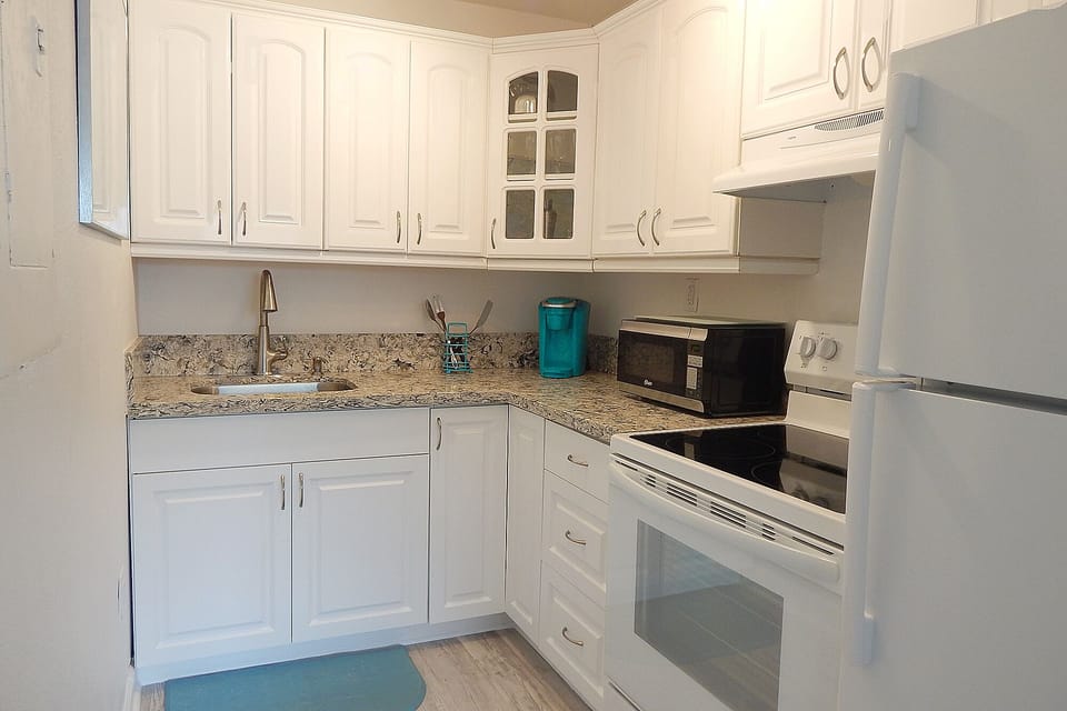 Newly renovated kitchen with full size appliances 
