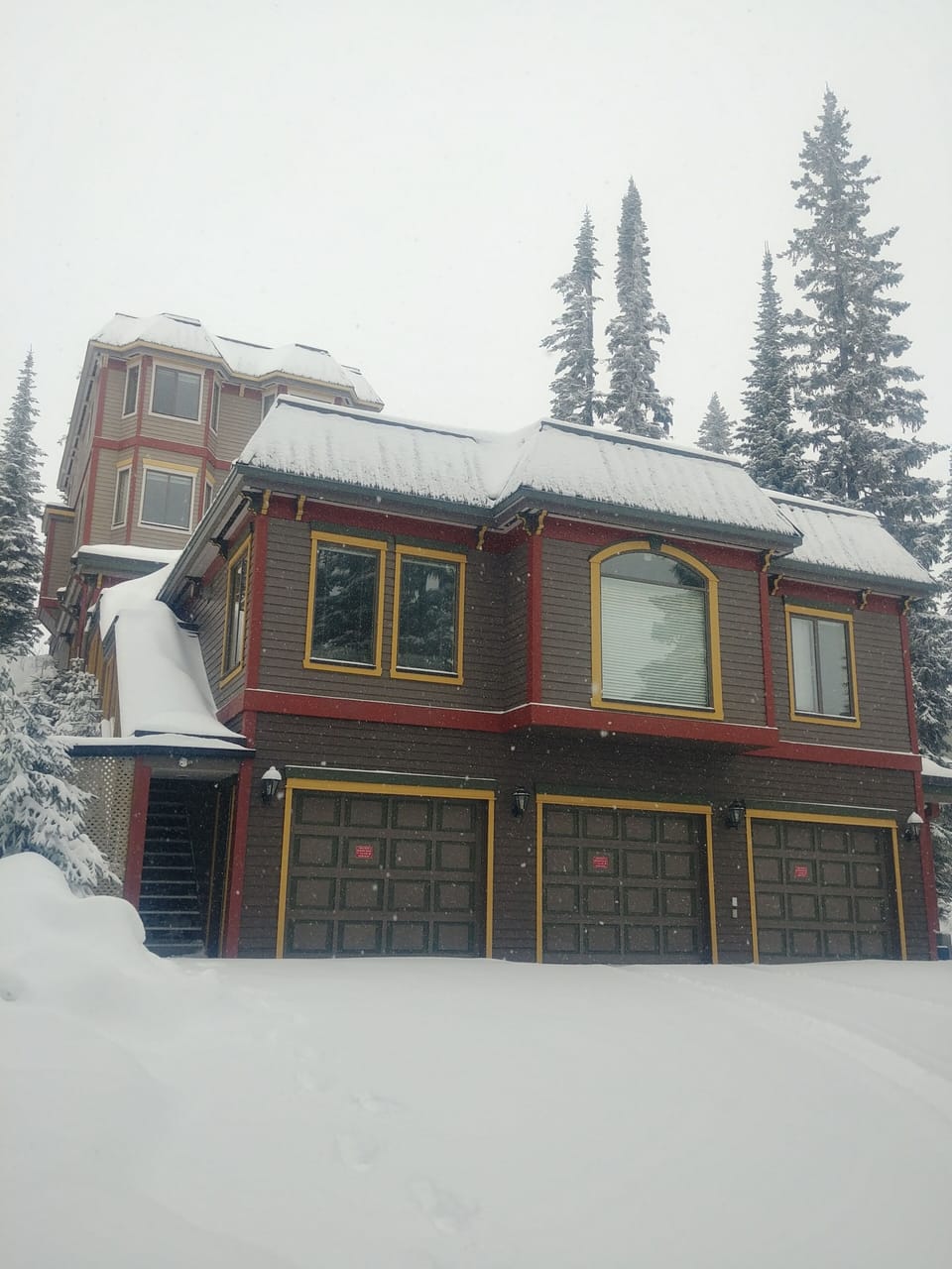 The Bear's den is the home located in front above the garage.